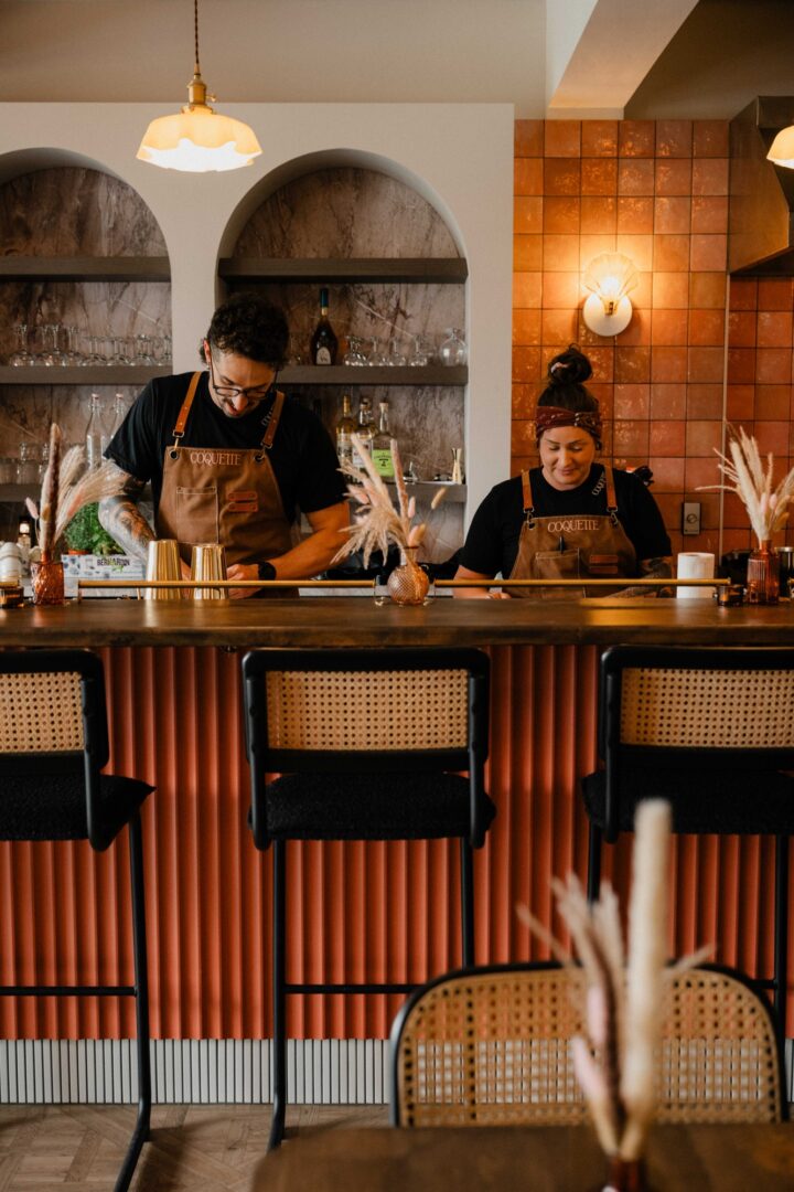 Dining room and kitchen at Coquette restaurant